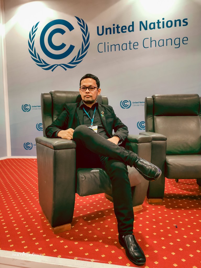 The speaker, Jhay, at one of the United Nations COP events he represented.